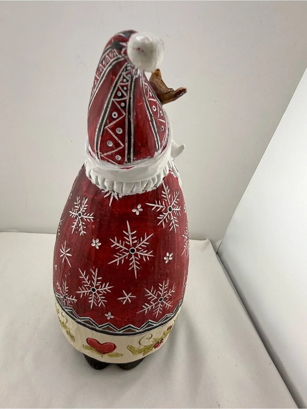 Folk art style resin Santa Claus figurine
